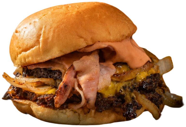 Hamburguesa de Don Pancho & Burger con cheddar fundido, cebolla y salsa